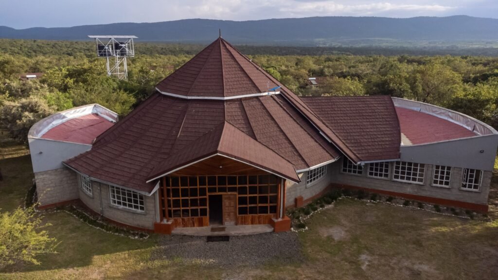 Mara Empiris Safari Camp main building beneath the Oloolaimutia hills