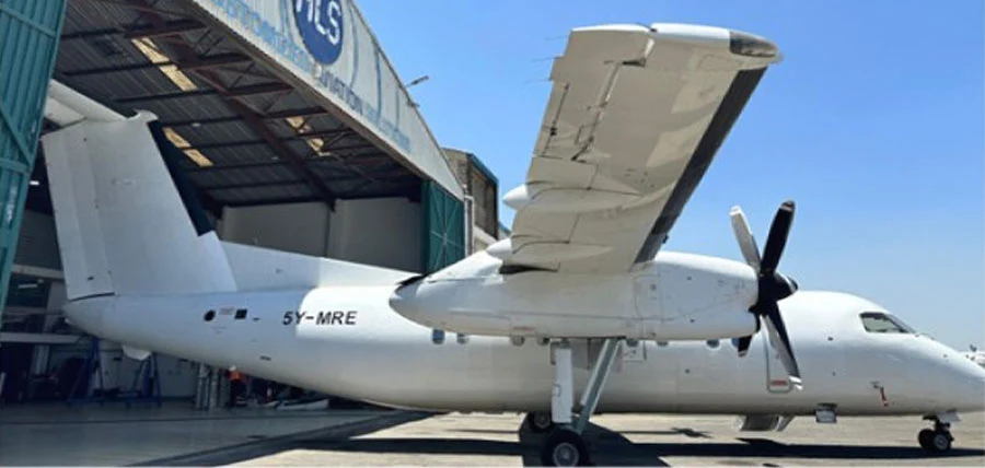 FlyALS twin-engine turboprop parked outside the hangar