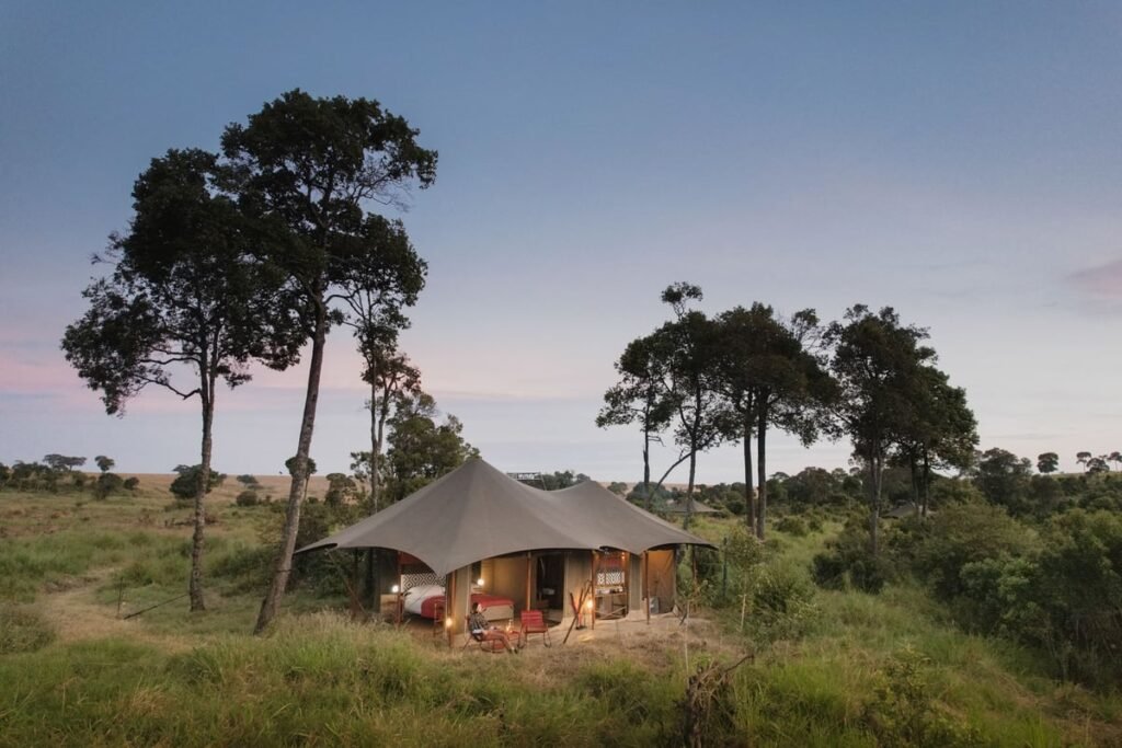 Angama Safari Camp guest tent and outdoor chairs at dusk