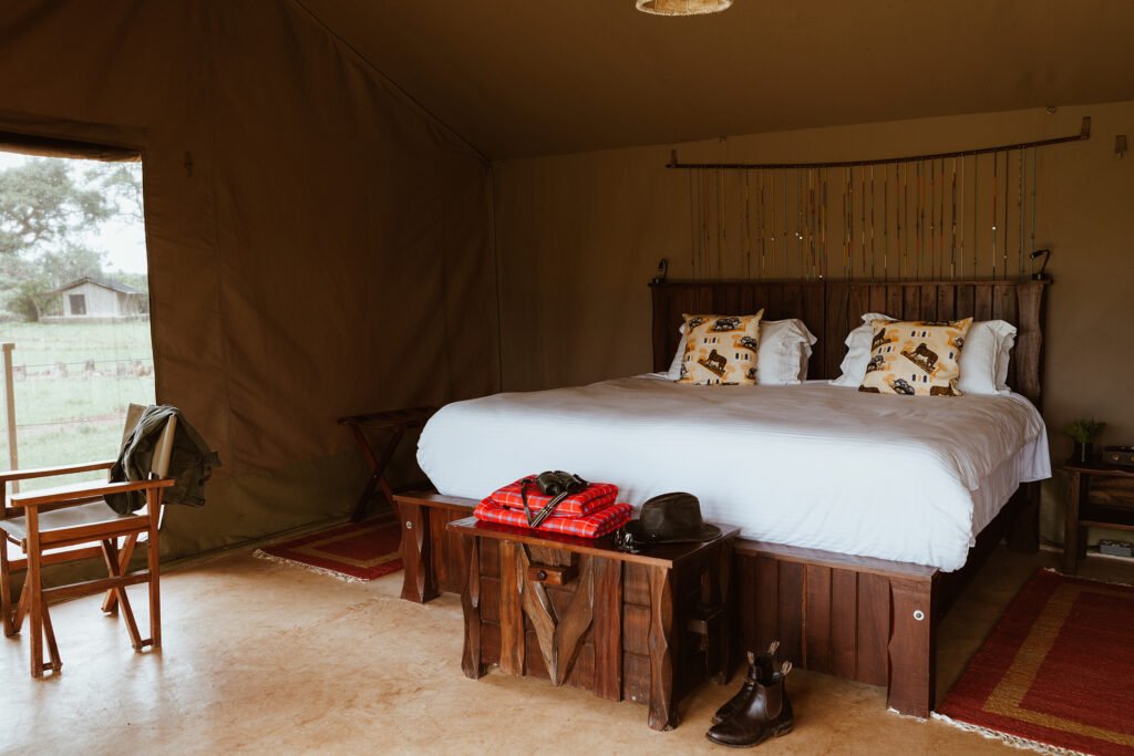 Basecamp Adventure double bed inside a canvas guest room