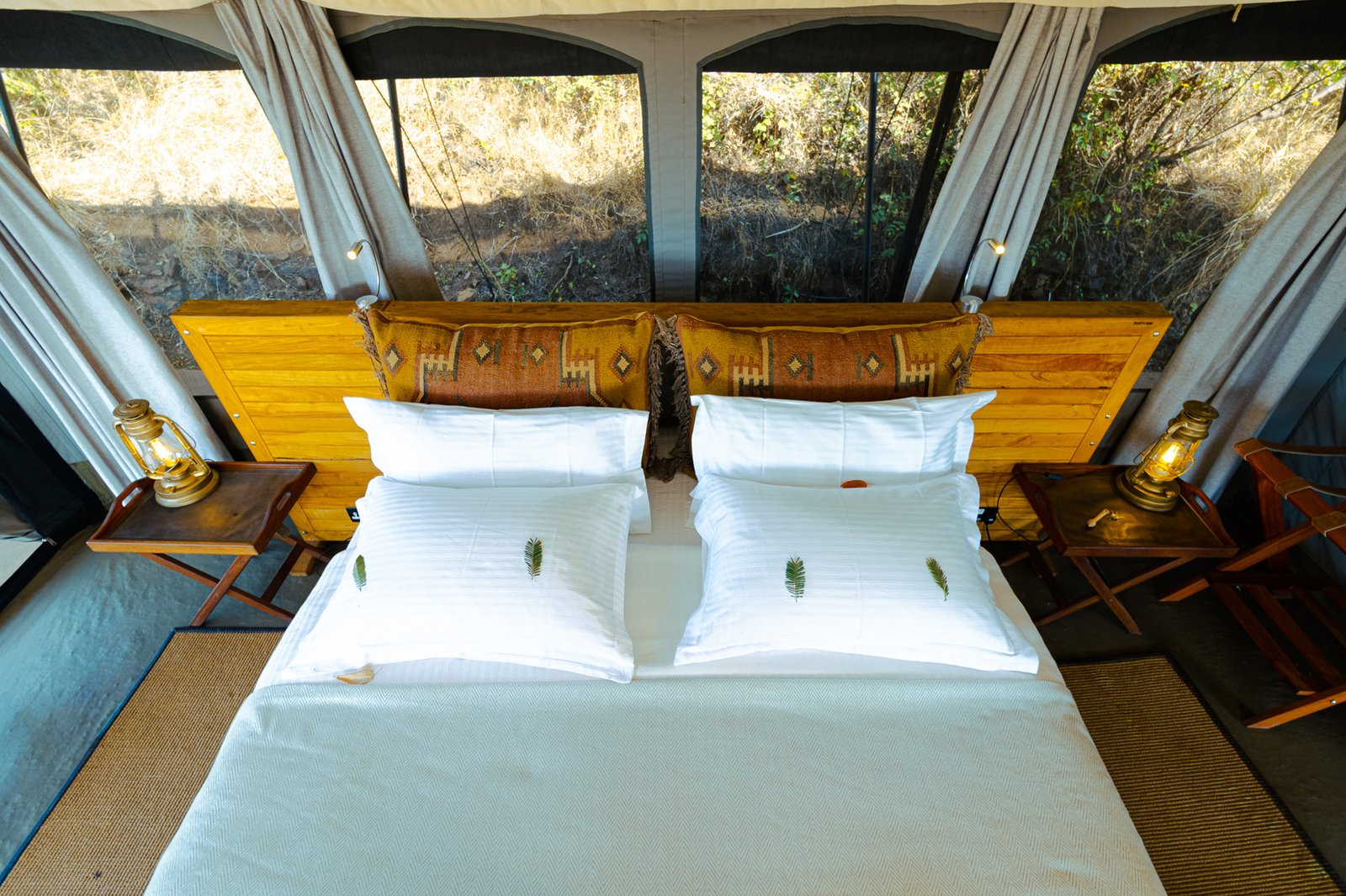 Basecamp Wilderness canvas guest bedroom with double bed and wide open views