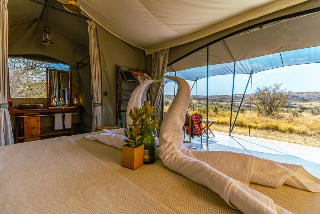 Basecamp Wilderness guest bathroom with freestanding bathtub and open canvas views