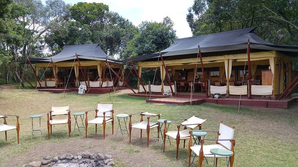 Elephant Pepper Camp communal canvas tents and outdoor campfire seating