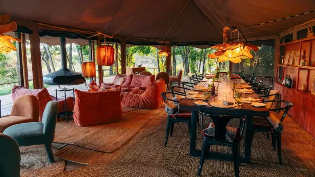 Emboo Camp lounge and dining area with colourful furnishings