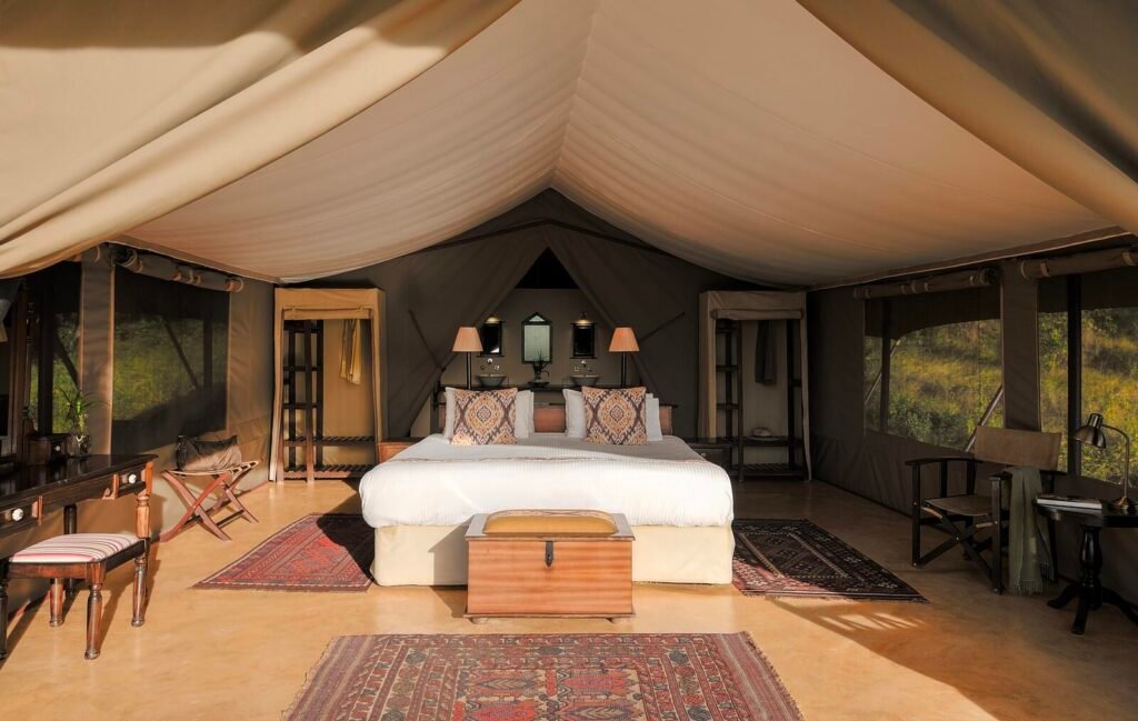 Entumoto Safari Camp Luxury Tent bed and ensuite area, requiring its own category quote