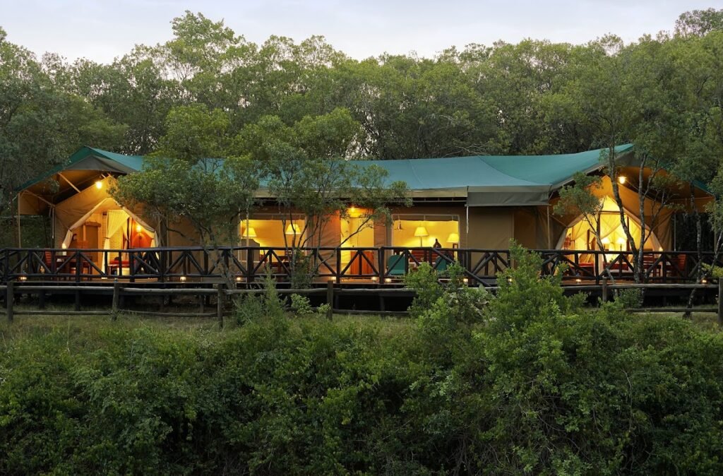 Fairmont Mara Safari Club riverfront tent exteriors joined by a timber deck