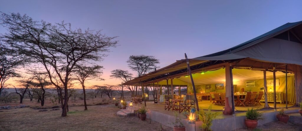 Maasai Mara lodges and camps 22 Kicheche Bush Olare canvas lounge and dining tent at sunset