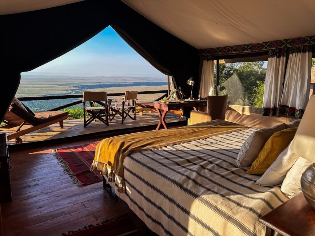 Maasai Mara lodges and camps 24 Kilima Camp tent bedroom and private veranda looking across the Mara plains