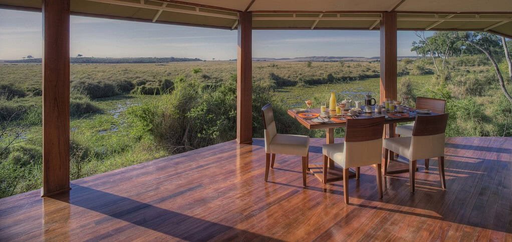 Ngerende in the Wild Lakeview veranda dining table overlooking the northern Mara landscape