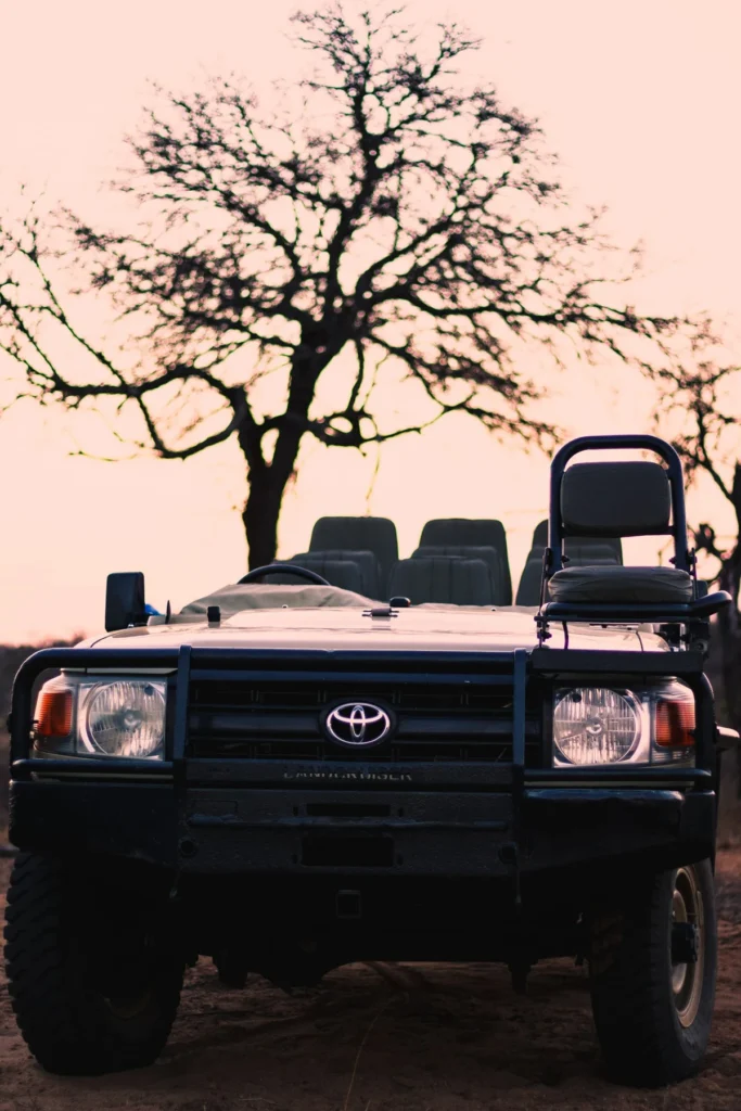 Land Cruiser Hire in Maasai Mara with a Professional Guide 2 Front view of an open Toyota Land Cruiser with raised safari seating