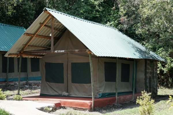 Lenchada Tourist Camp deluxe canvas tent exterior beneath trees