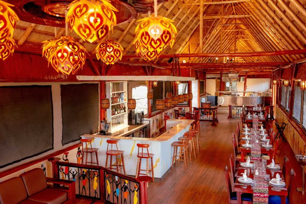 Lilita Keper dining room and bar beneath a thatched roof