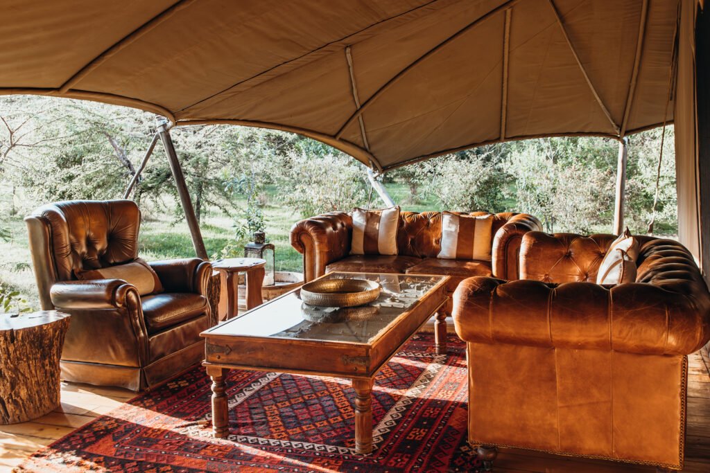 Mara Expedition Camp open canvas lounge overlooking the trees