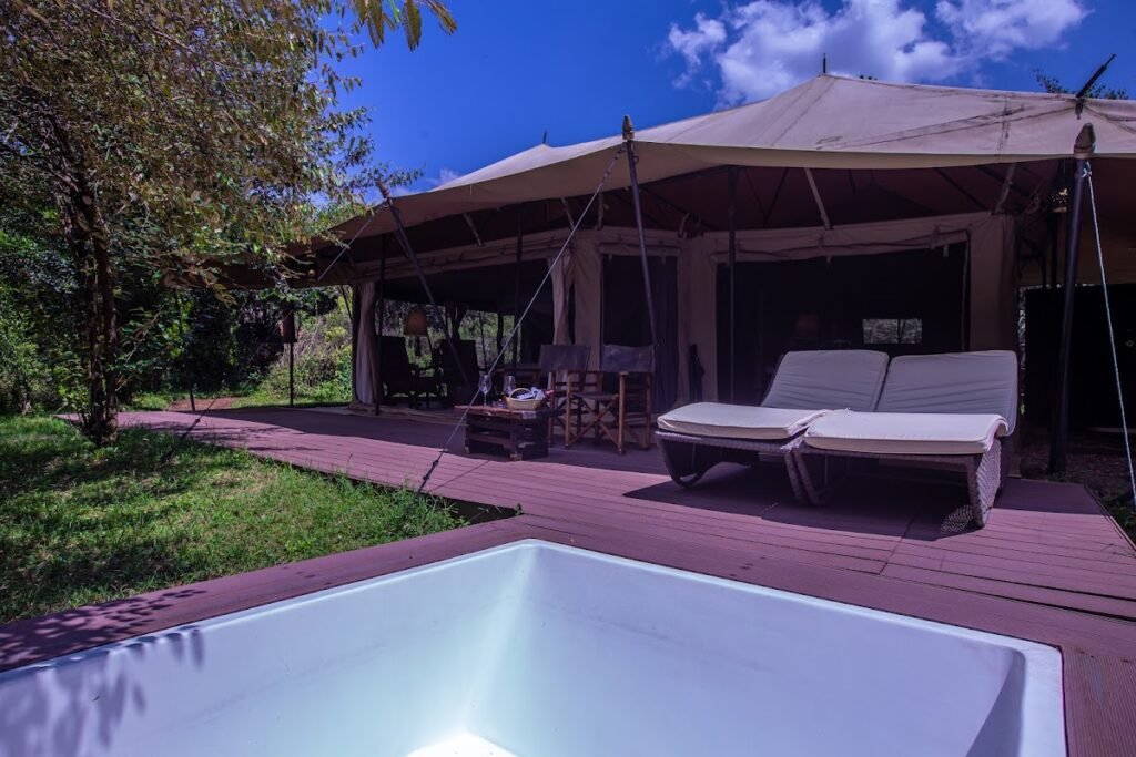 Private plunge pool outside a Mara Ngenche Safari Camp canvas tent