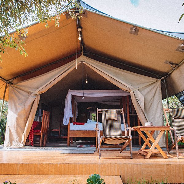Mara Siligi Camp guest tent opening onto private outdoor seating