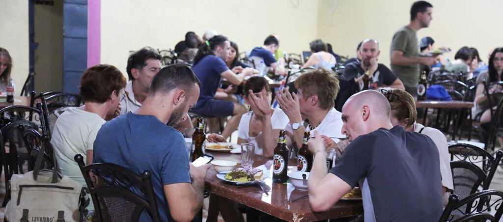 Guests dining in the Miti Mingi Eco Camp restaurant