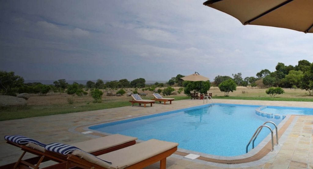 Naserian Mara Camp outdoor swimming pool and loungers
