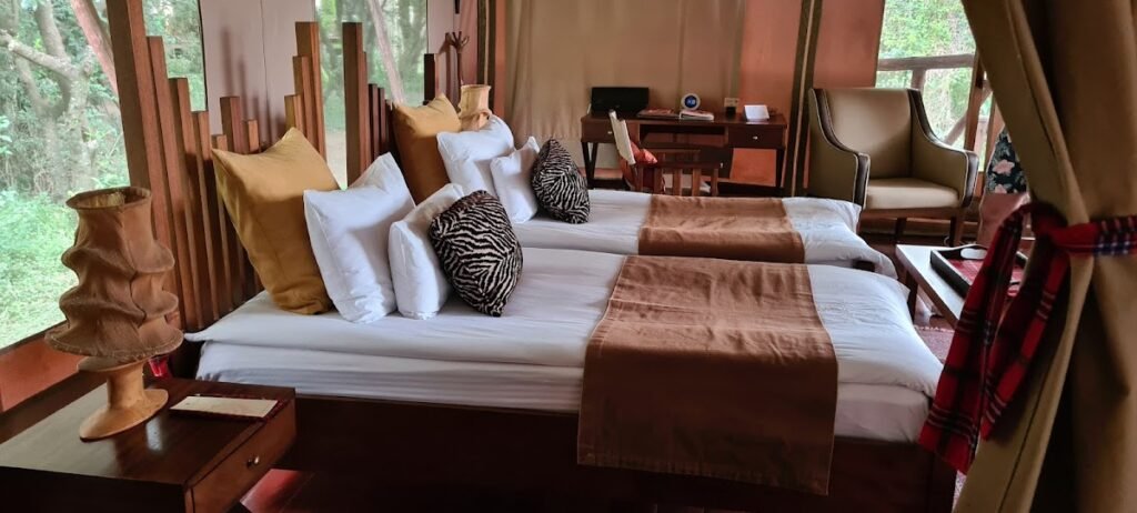 Neptune Mara Rianta twin-bed tent with carved wooden bedside posts