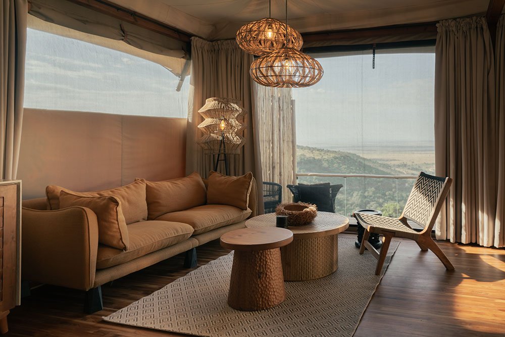 Pearl Mara lounge with canvas walls, woven lights and a view through the window