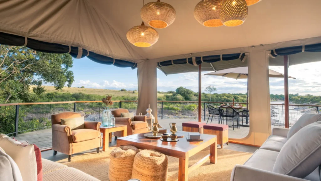 Rekero Camp lounge with sofas and river views