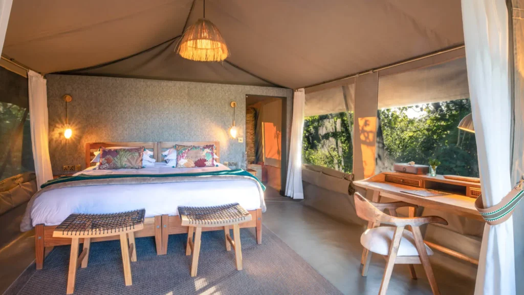Updated Rekero Camp guest-tent interior with double bed