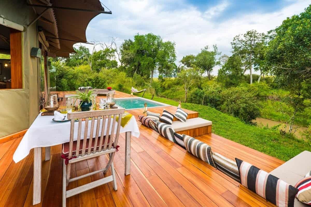 Sala’s Camp wooden deck with dining table, sunken seating and private plunge pool