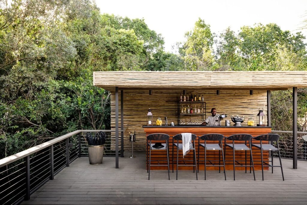 Sanctuary Olonana timber bar on the river-facing deck
