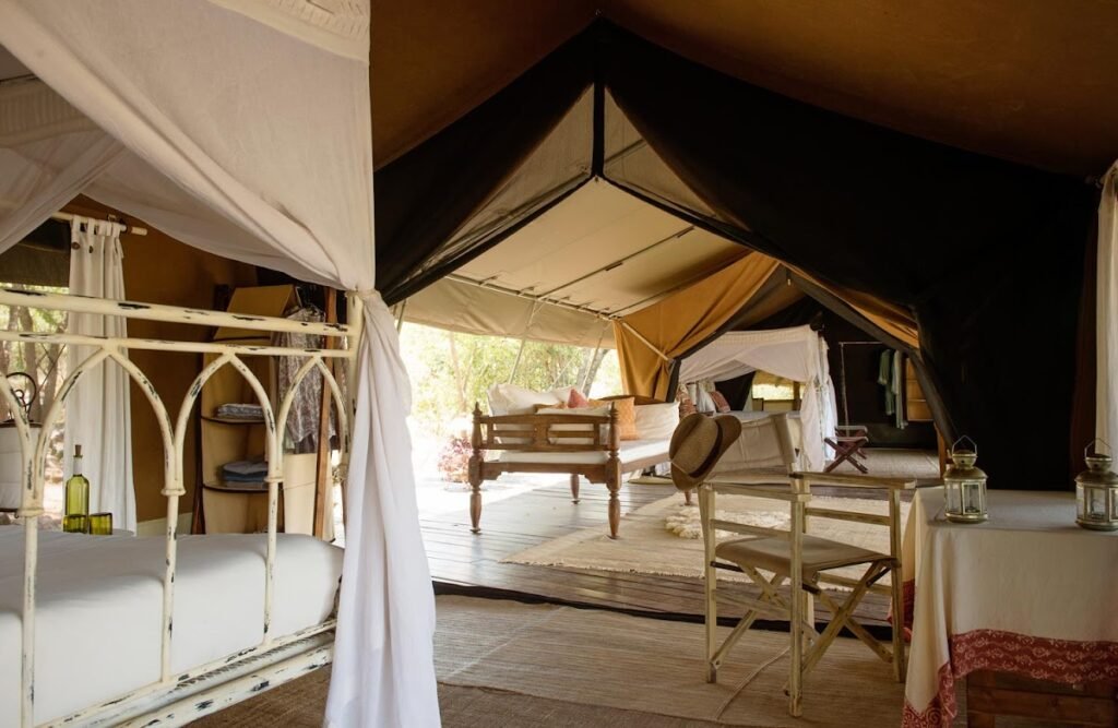 Serian The Original family tent with connected canvas sleeping spaces and timber deck