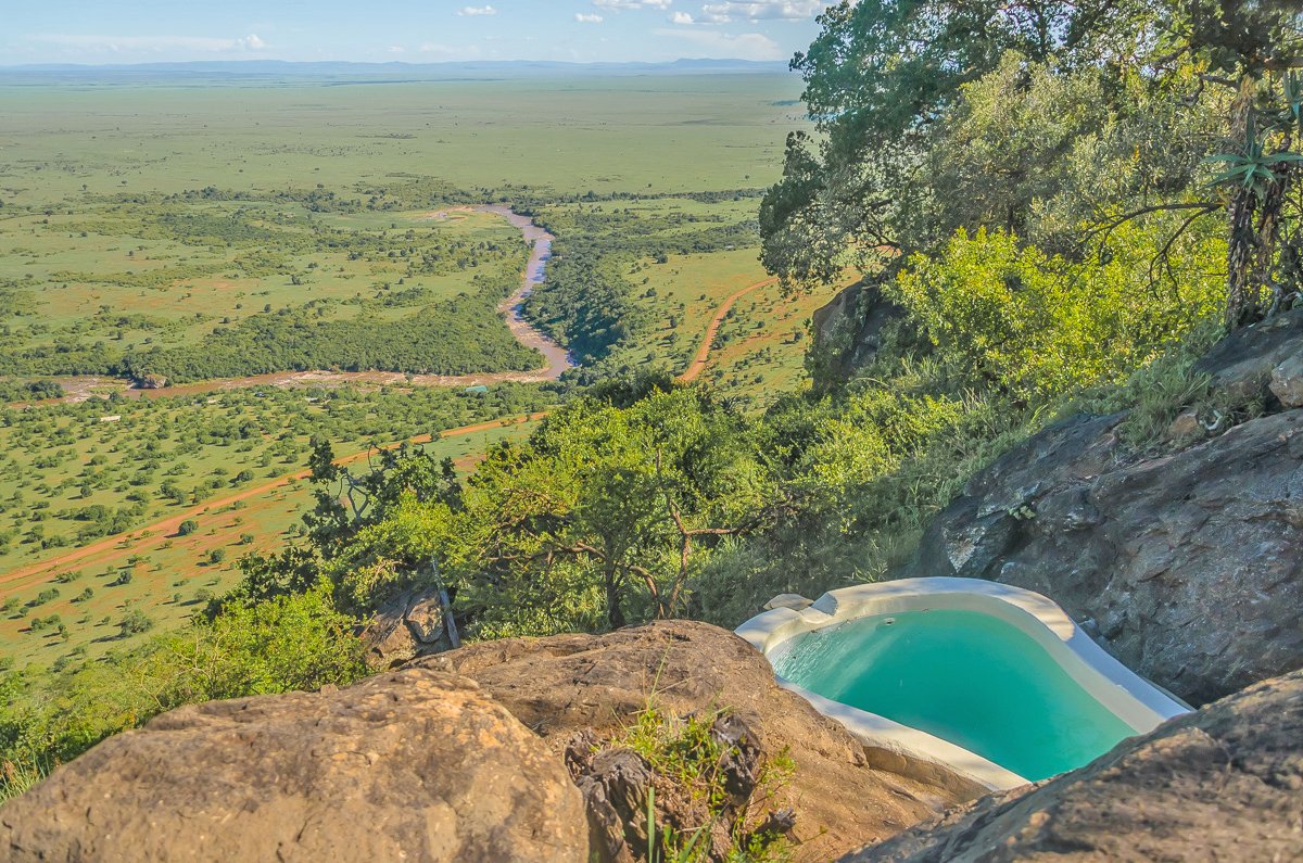 Mara Siria Tented Camp shared plunge pool among rocks above the Mara Triangle