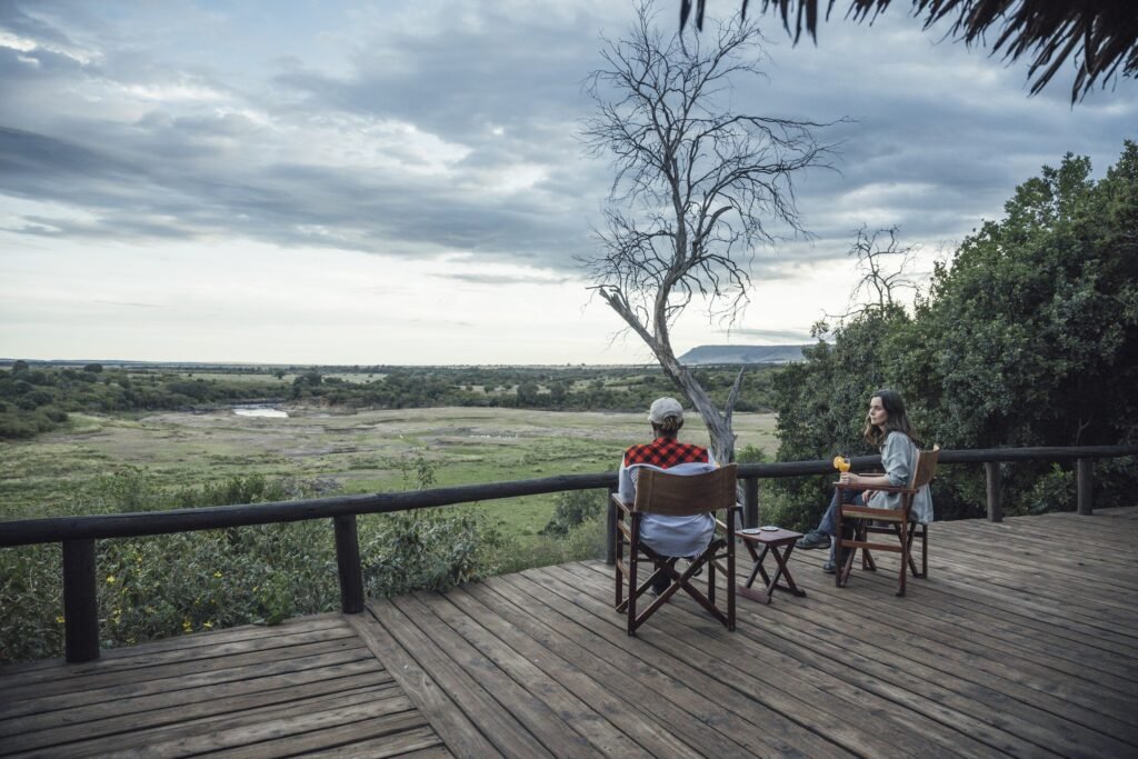 Tangulia Mara Camp veranda seating overlooking the salt lick and river landscape