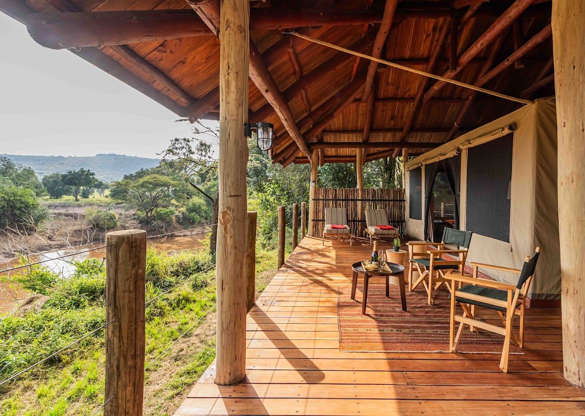 Royal Mara River Suite wooden veranda overlooking the Mara River